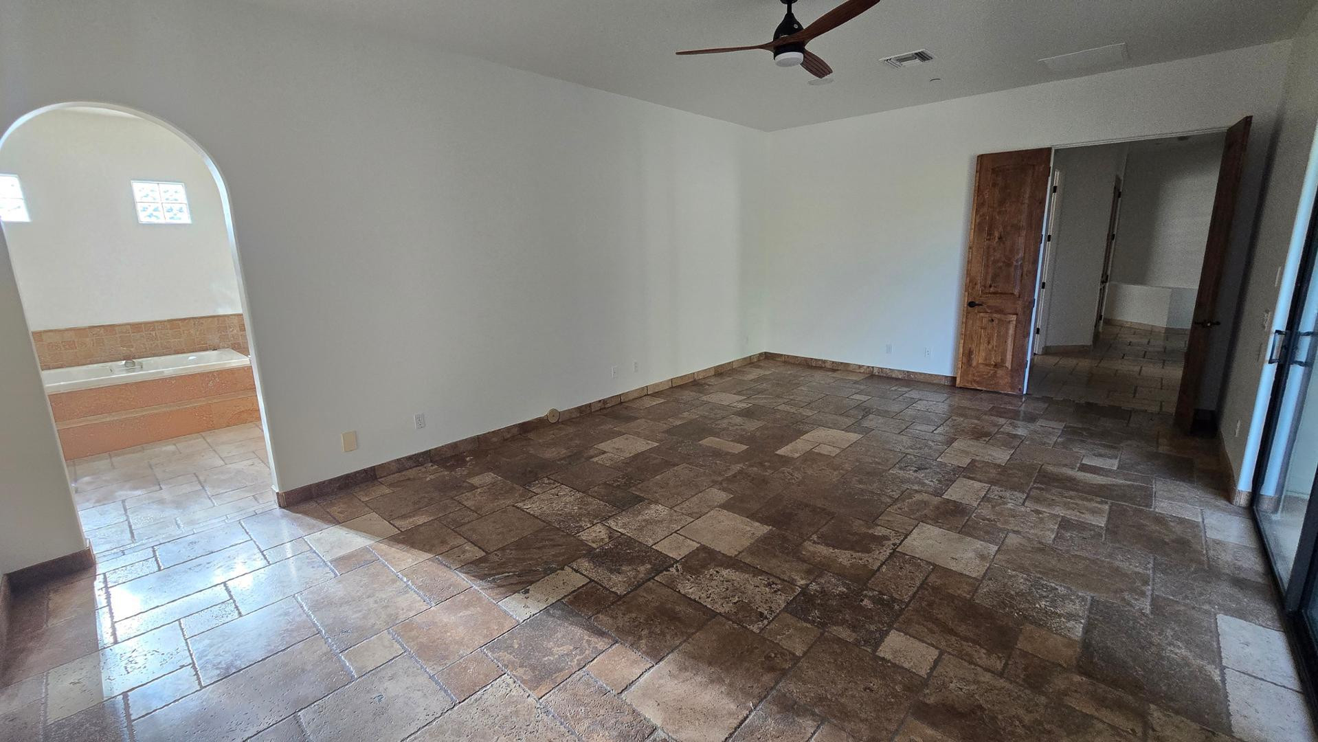 4485 East Quail Brush Road Cave Creek, AZ 85331 - Photo 31 of 64 an empty room with a mirror