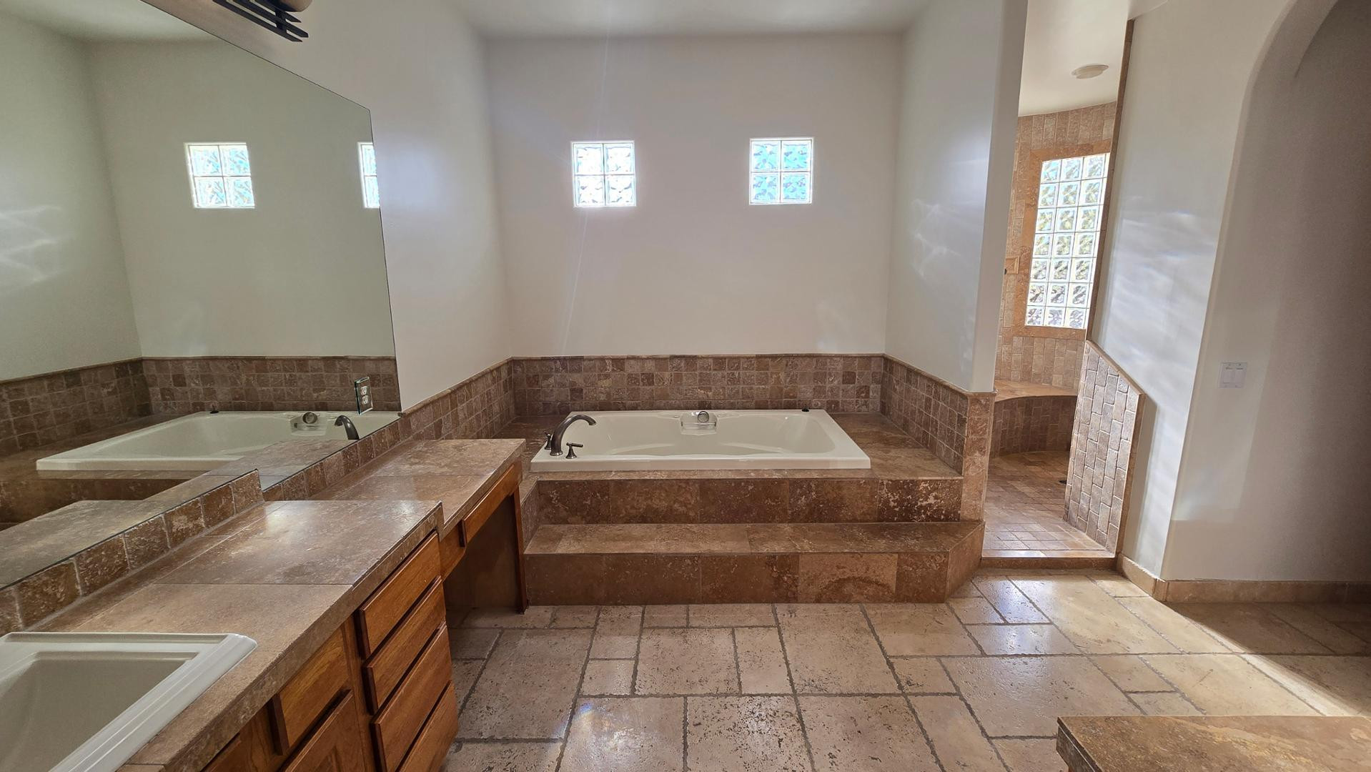 4485 East Quail Brush Road Cave Creek, AZ 85331 - Photo 32 of 64 a view of a bathroom with sink and window