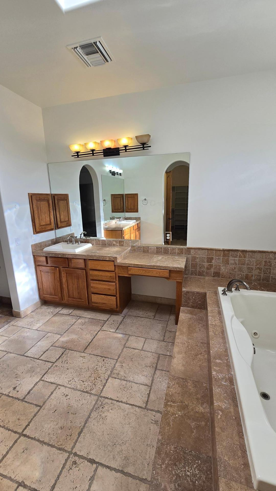 4485 East Quail Brush Road Cave Creek, AZ 85331 - Photo 35 of 64 a room with a bed and a television