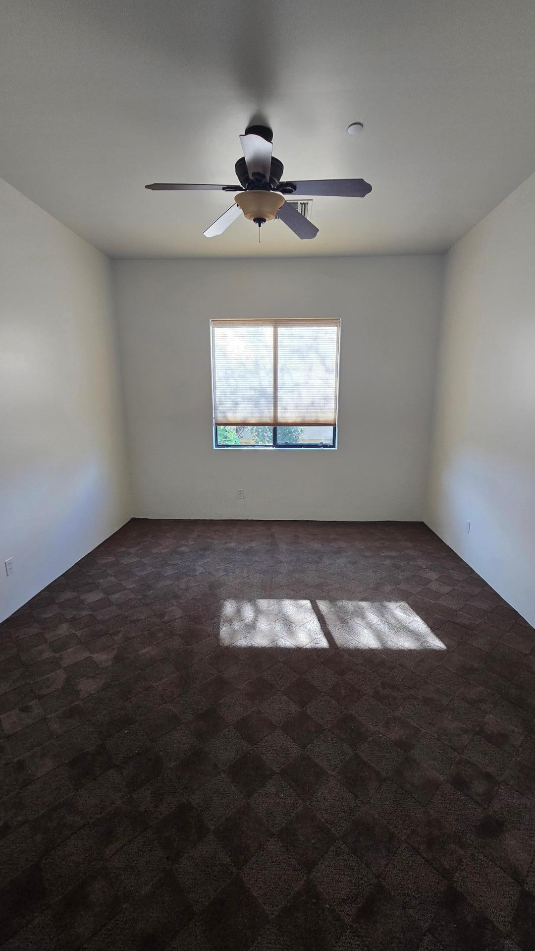 4485 East Quail Brush Road Cave Creek, AZ 85331 - Photo 43 of 64 an empty room with a window
