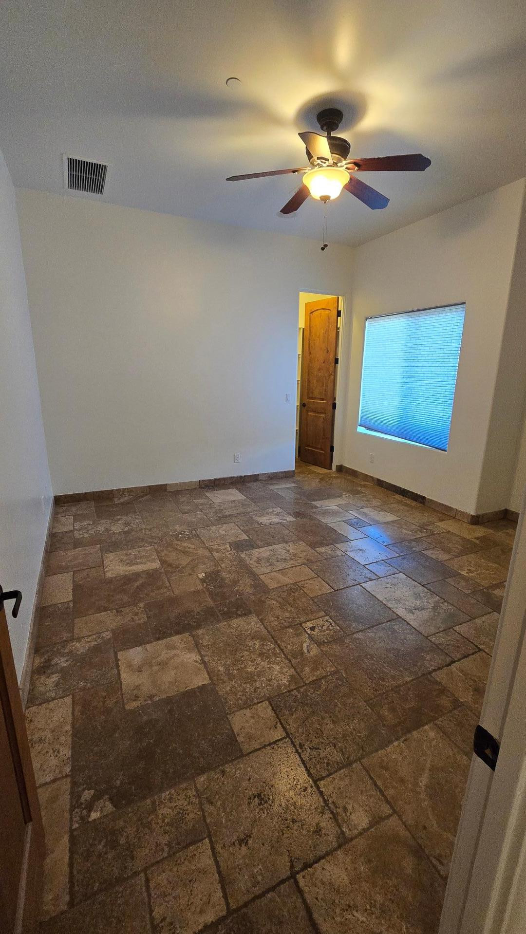 4485 East Quail Brush Road Cave Creek, AZ 85331 - Photo 44 of 64 a view of an empty room with a window