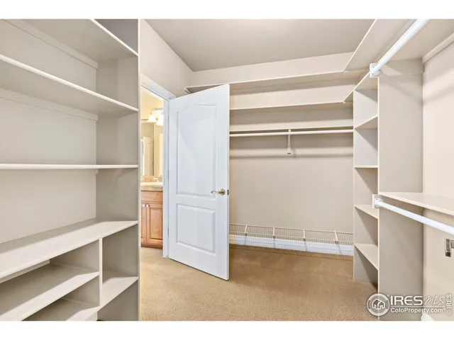 a view of an empty walk in closet