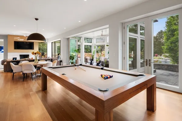 a view of kitchen with a table and chairs