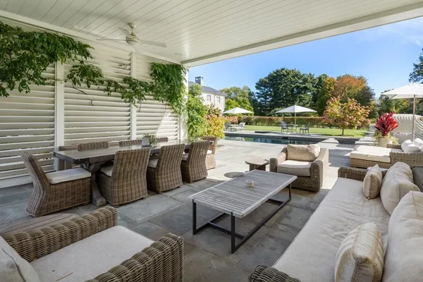 a outdoor living space with furniture and a potted plant