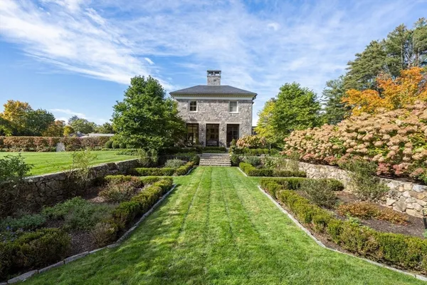 a view of a garden with an outdoor space