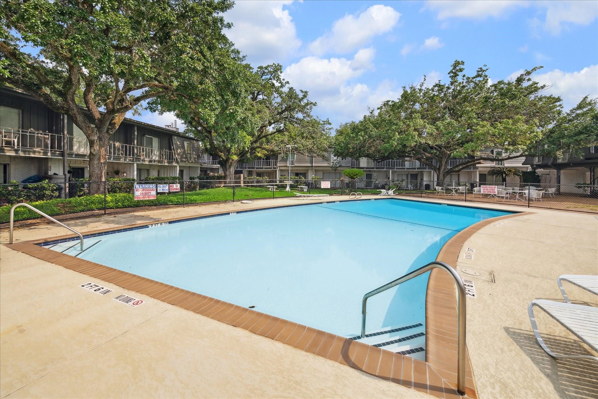 7821 Rue St Cyr Street, Unit 55 Houston, TX 77074 - Photo 14 of 16 Community pool just steps from the home.