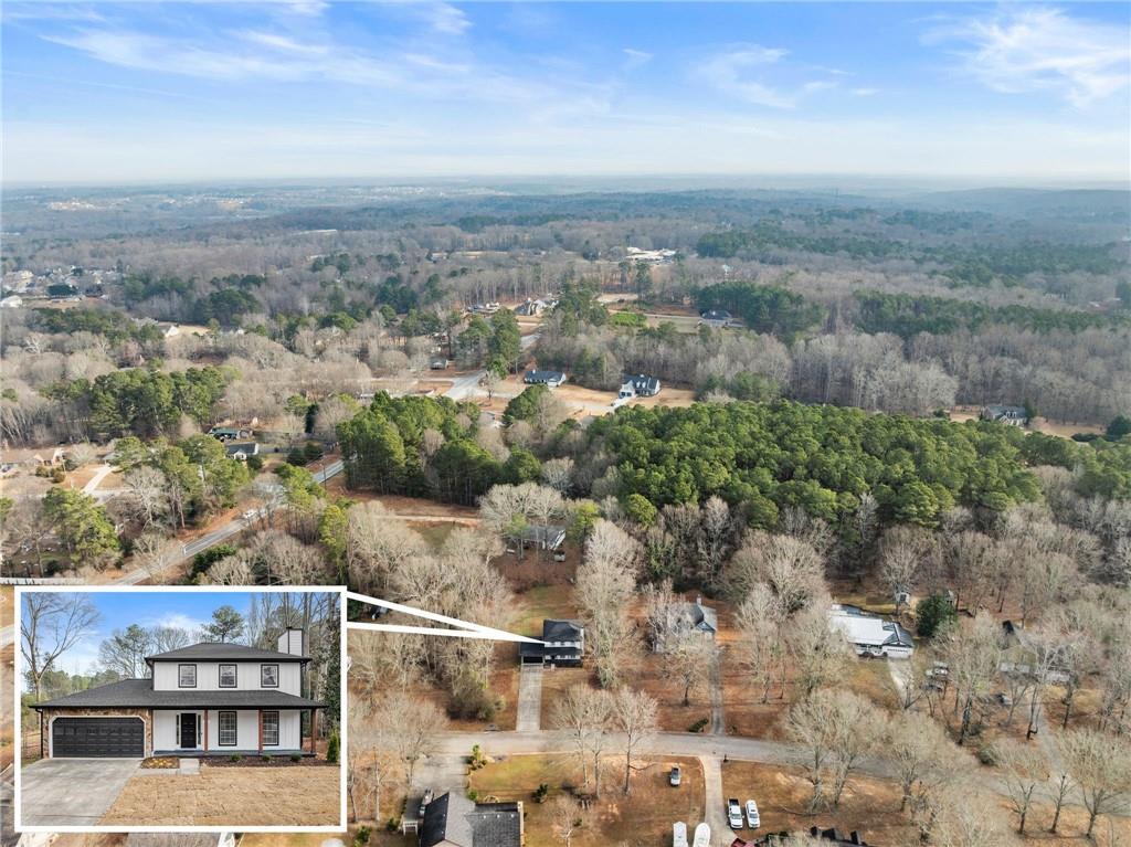 604 Fox Run Winder, GA 30680 - Photo 2 of 38 an aerial view of residential houses with outdoor space