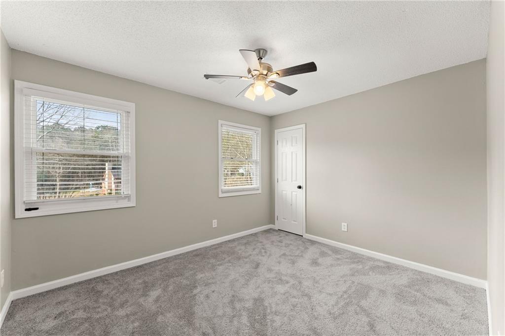 604 Fox Run Winder, GA 30680 - Photo 22 of 38 a view of an empty room with a window