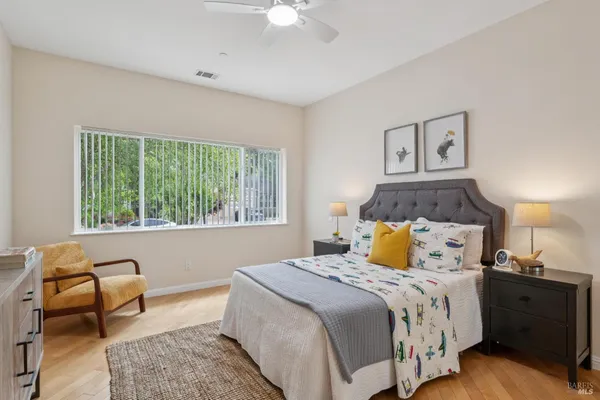 a bedroom with a bed and a couch