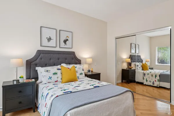 a bedroom with a bed and window