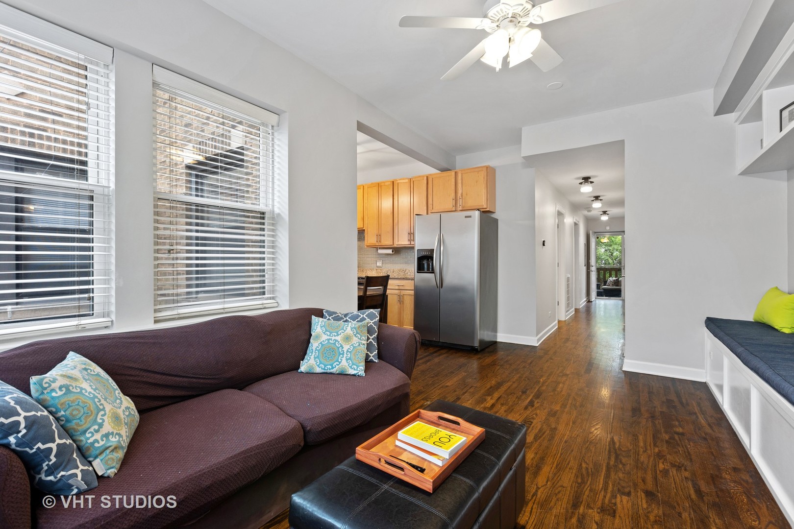 1520 West Addison Street, Unit 1 Chicago, IL 60613 - Photo 3 of 12 a living room with furniture and a wooden floor