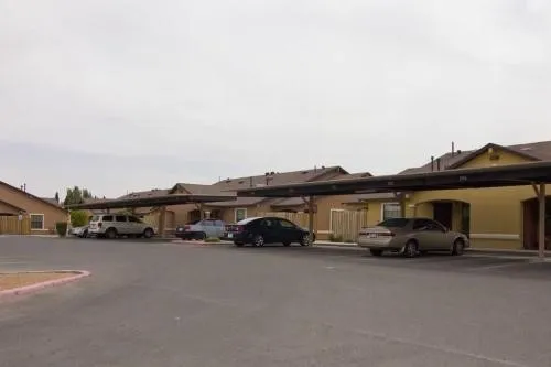a view of street with parked cars