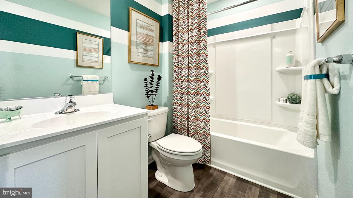 1509 Avon Way Salisbury, MD 21801 - Photo 22 of 27 a bathroom with a sink toilet and shower