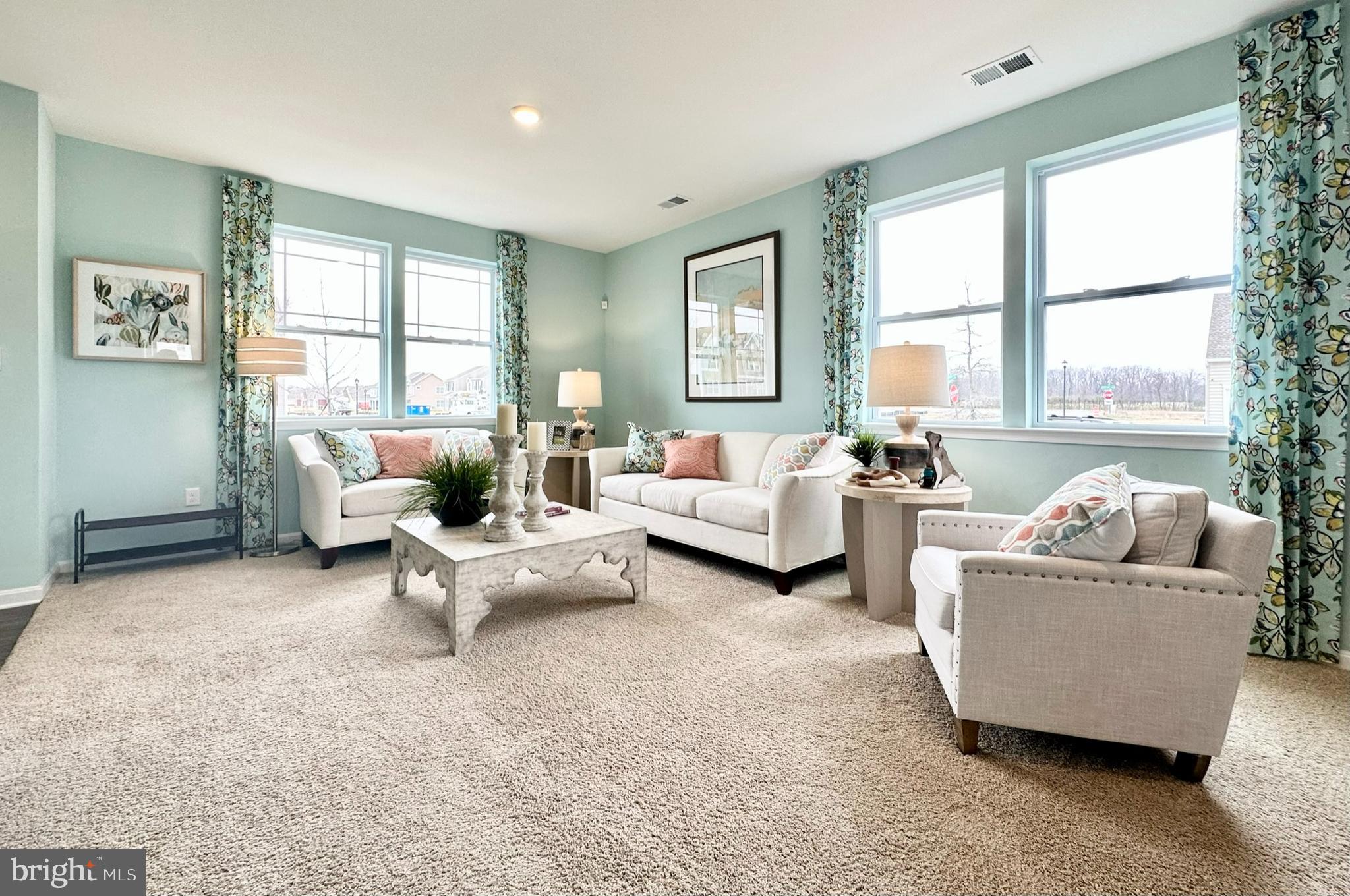 1509 Avon Way Salisbury, MD 21801 - Photo 4 of 27 a living room with furniture and a large window