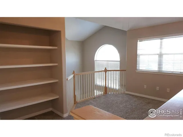 a black and white photo of a living room