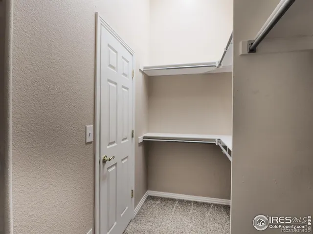a bathroom with a tub and a sink