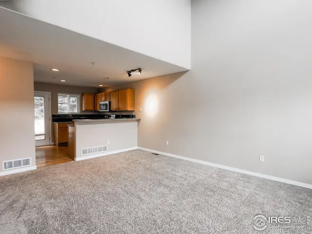 a view of a kitchen with a sink