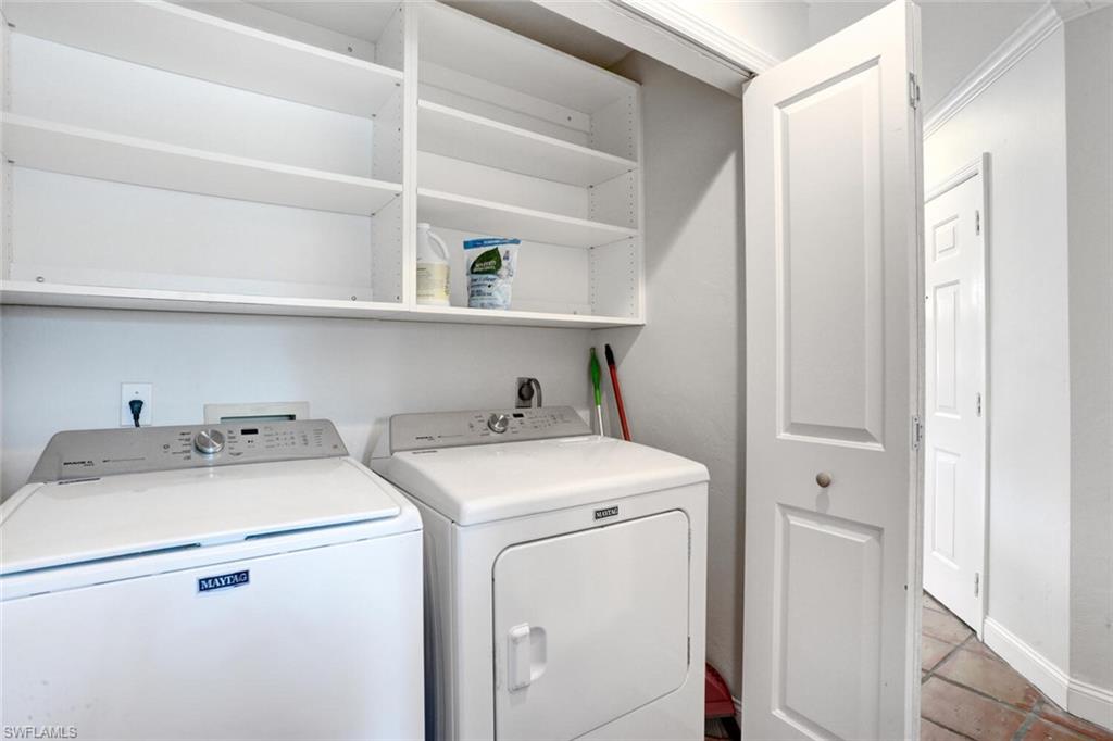 6535 Valen Way, Unit E202 Naples, FL 34108 - Photo 29 of 33 a utility room with dryer and washer