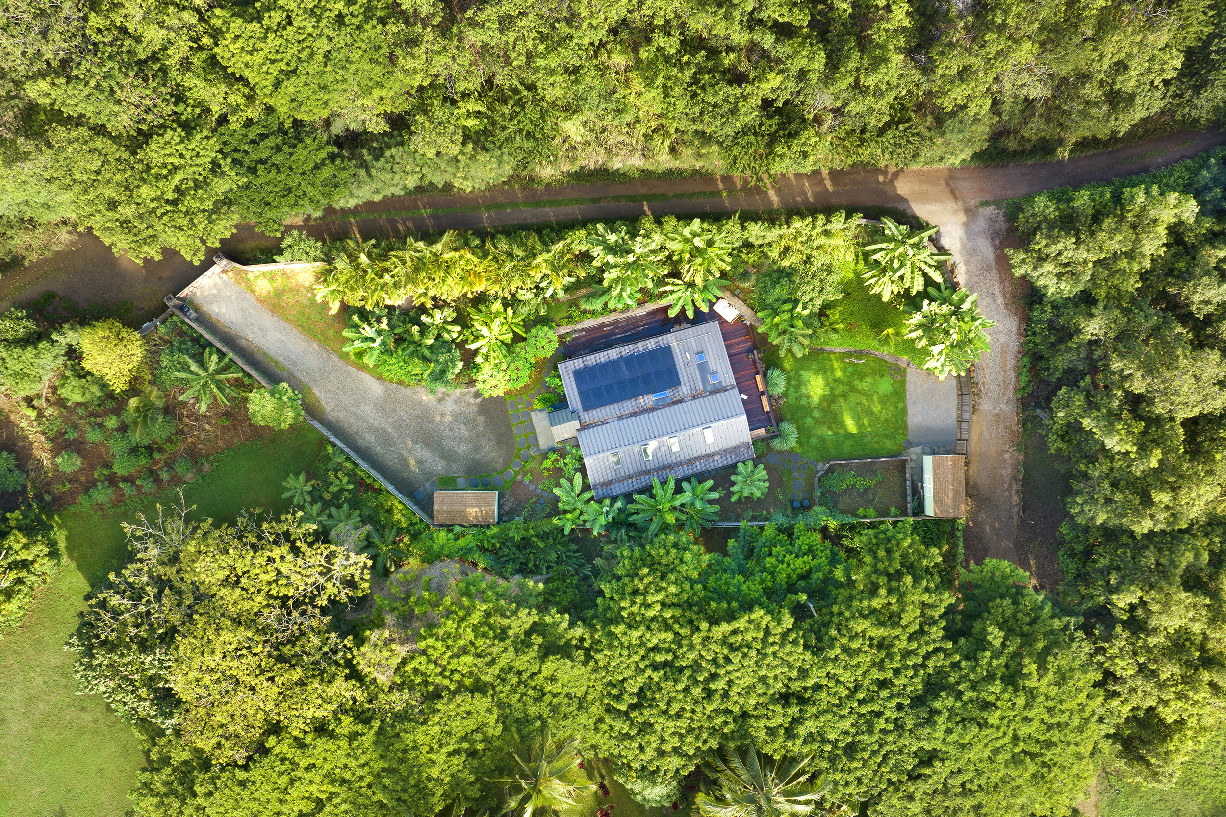 3720A Moloaa Road Kapaa, HI 96746 - Photo 16 of 17 an aerial view of a house with a yard