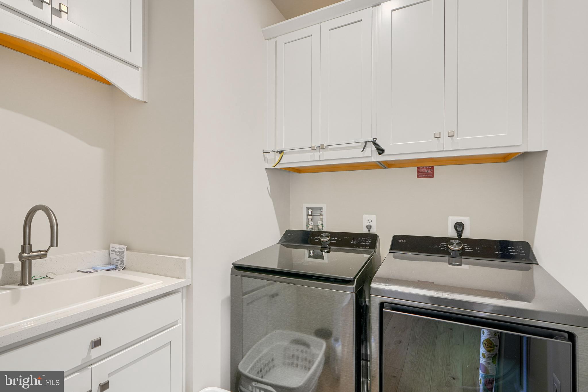 8511 Lallybroch Lane Fulton, MD 20759 - Photo 45 of 78 Laundry on main level with sink