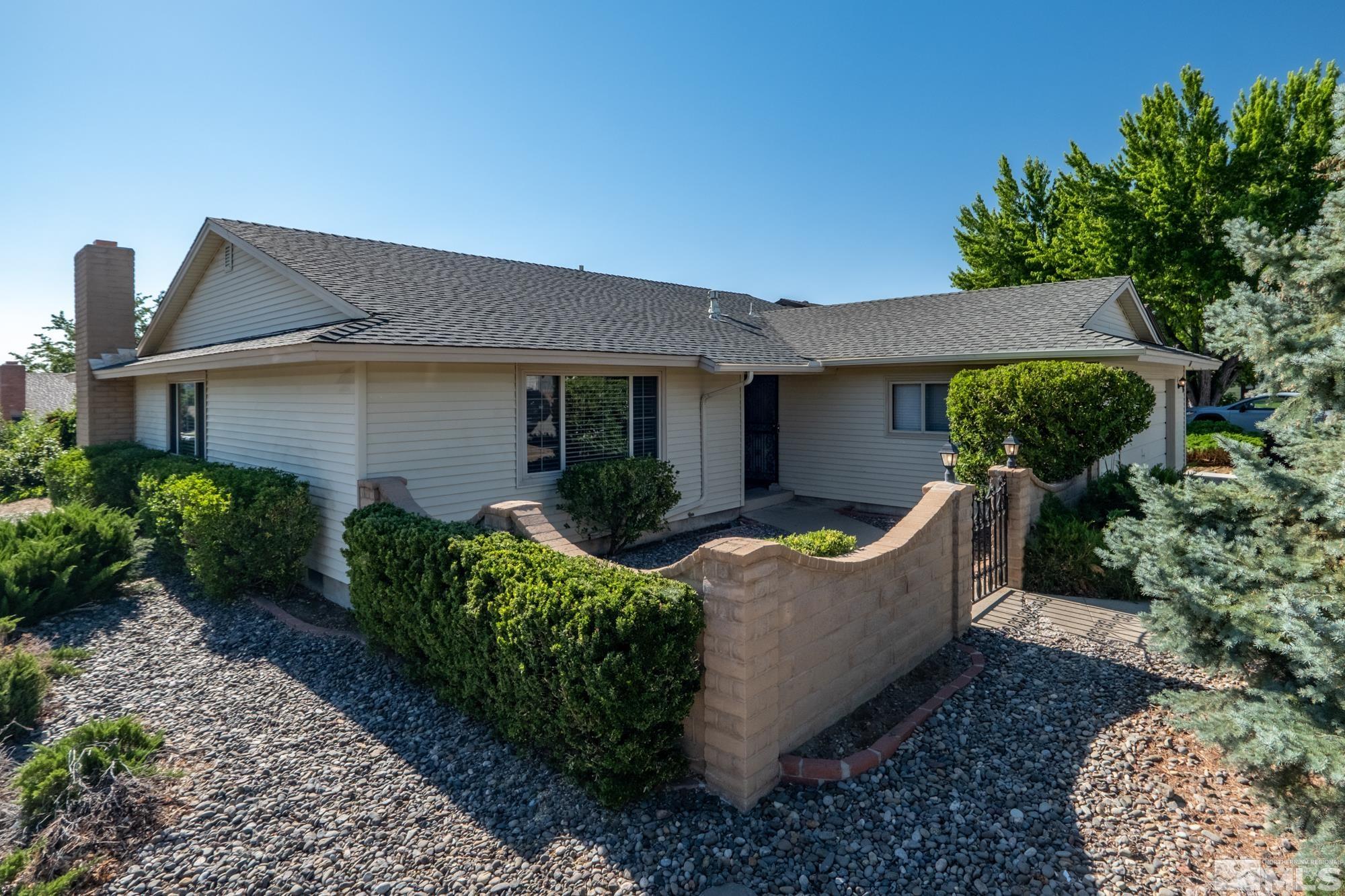 560 Peter Reno, NV 89503 - Photo 1 of 21 a front view of a house with garden
