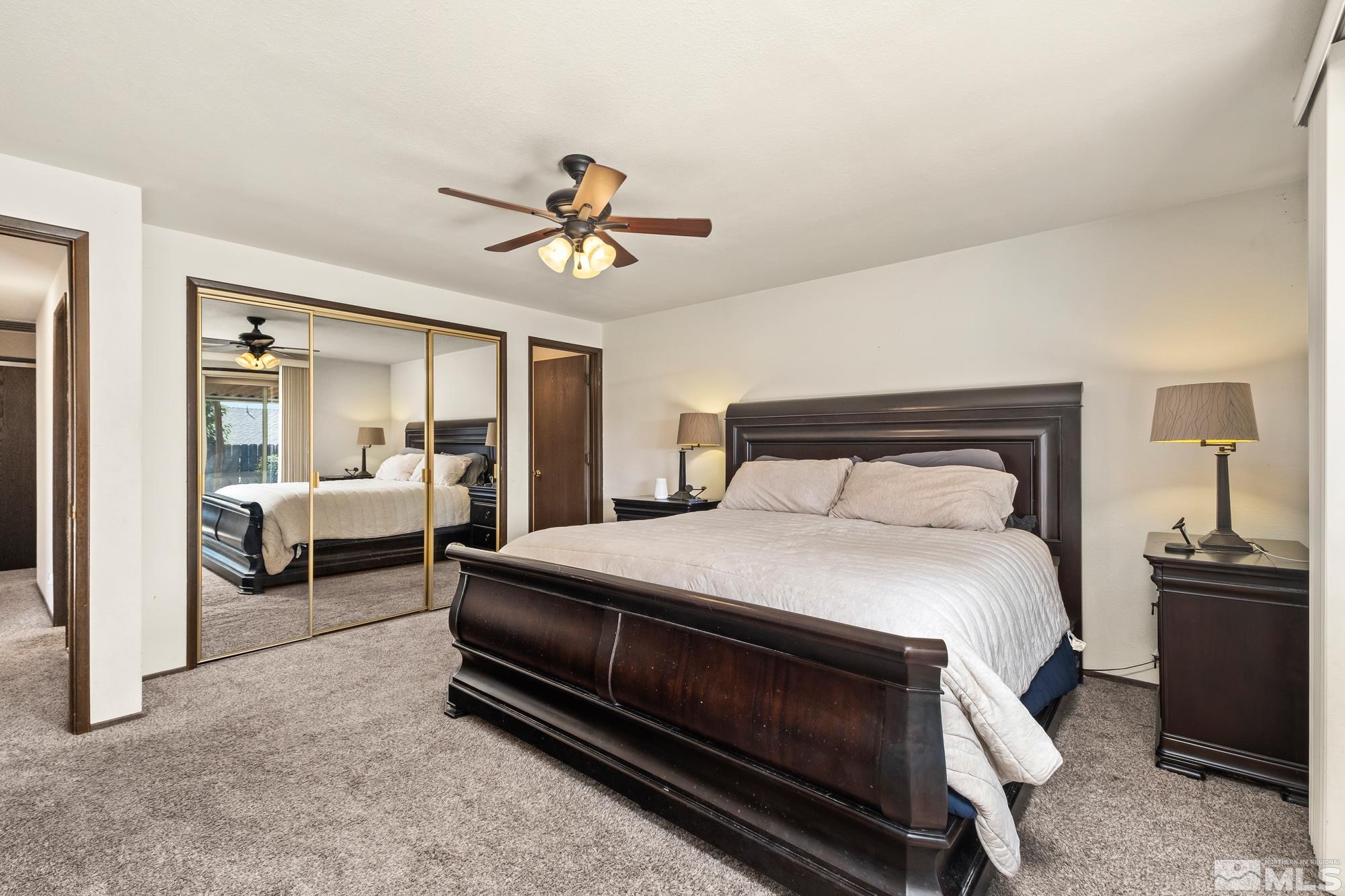 560 Peter Reno, NV 89503 - Photo 14 of 21 a bedroom with a large bed and furniture