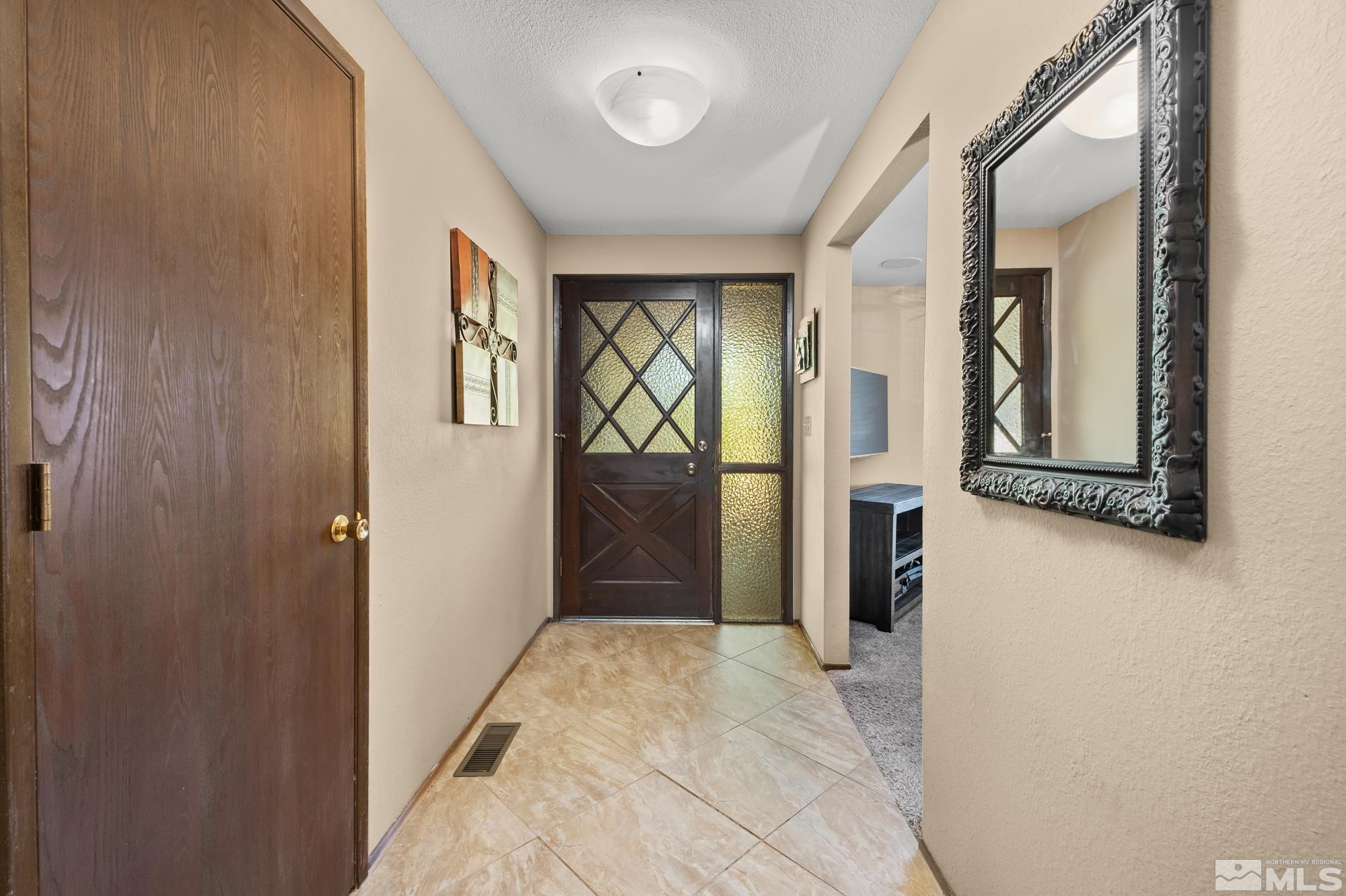 560 Peter Reno, NV 89503 - Photo 21 of 21 a view of a hallway with wooden shelves