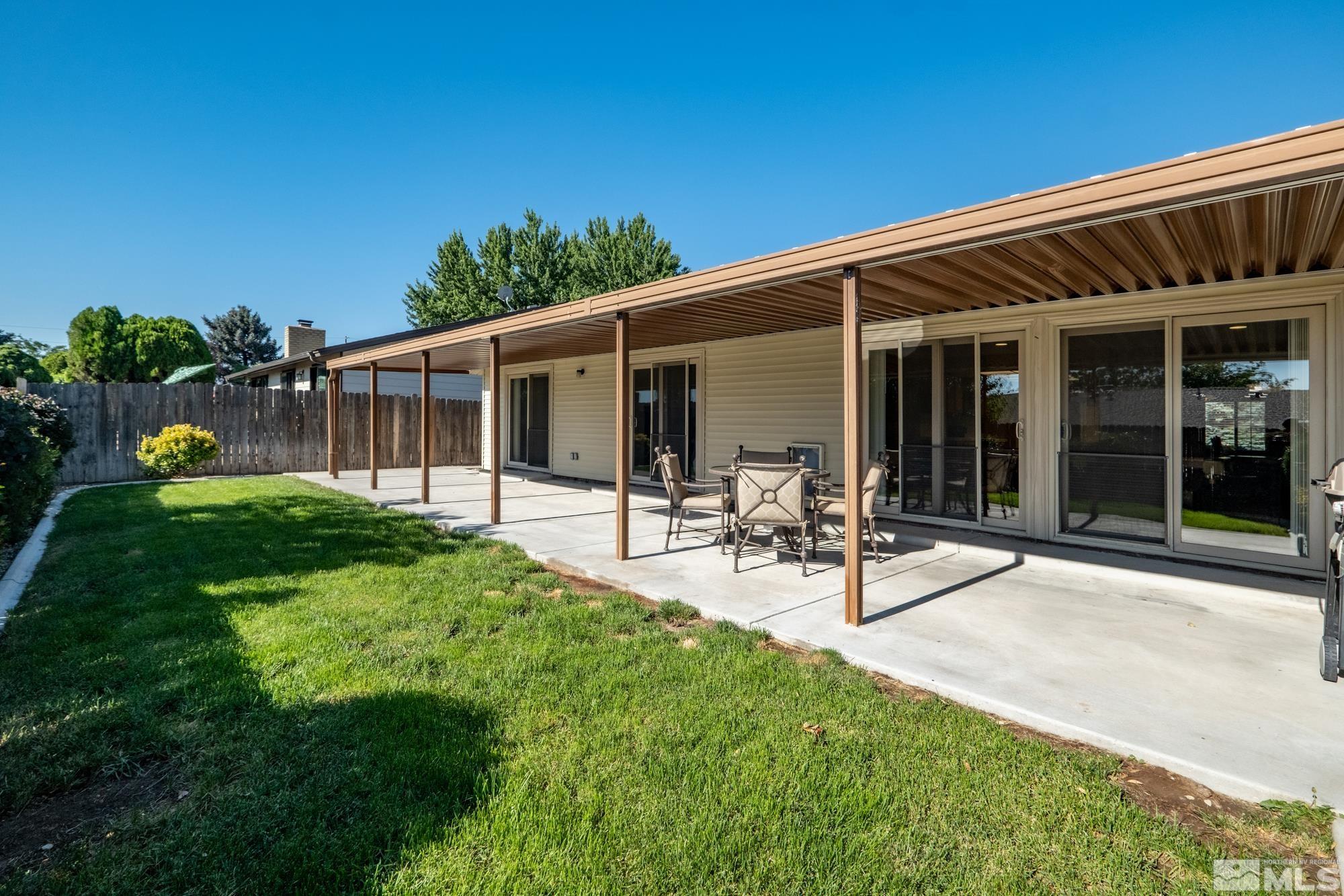 560 Peter Reno, NV 89503 - Photo 5 of 21 a view of a house with backyard sitting area and garden