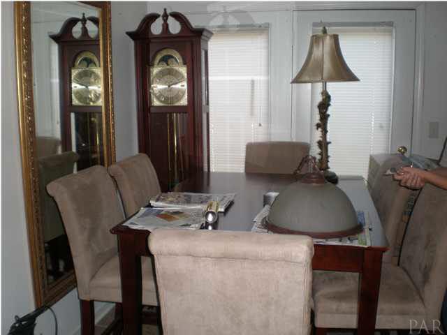 814 East Montclair Road Pensacola, FL 32505 - Photo 5 of 10 Dining Room With French Doors to Backyard