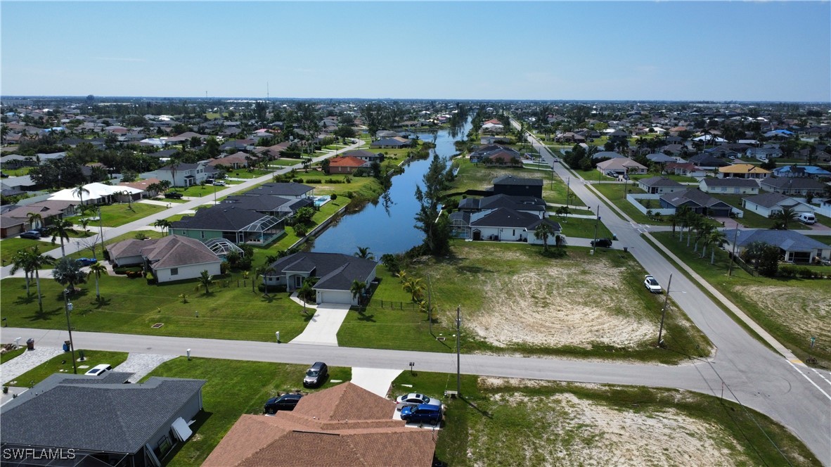 820 Southwest 28th Street Cape Coral, FL 33914 - Photo 13 of 17 an aerial view of residential houses with outdoor space