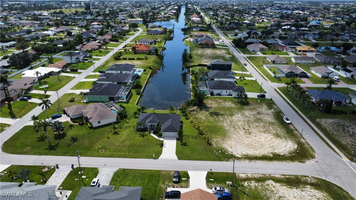 820 Southwest 28th Street Cape Coral, FL 33914 - Photo 14 of 17 an aerial view of residential houses with outdoor space