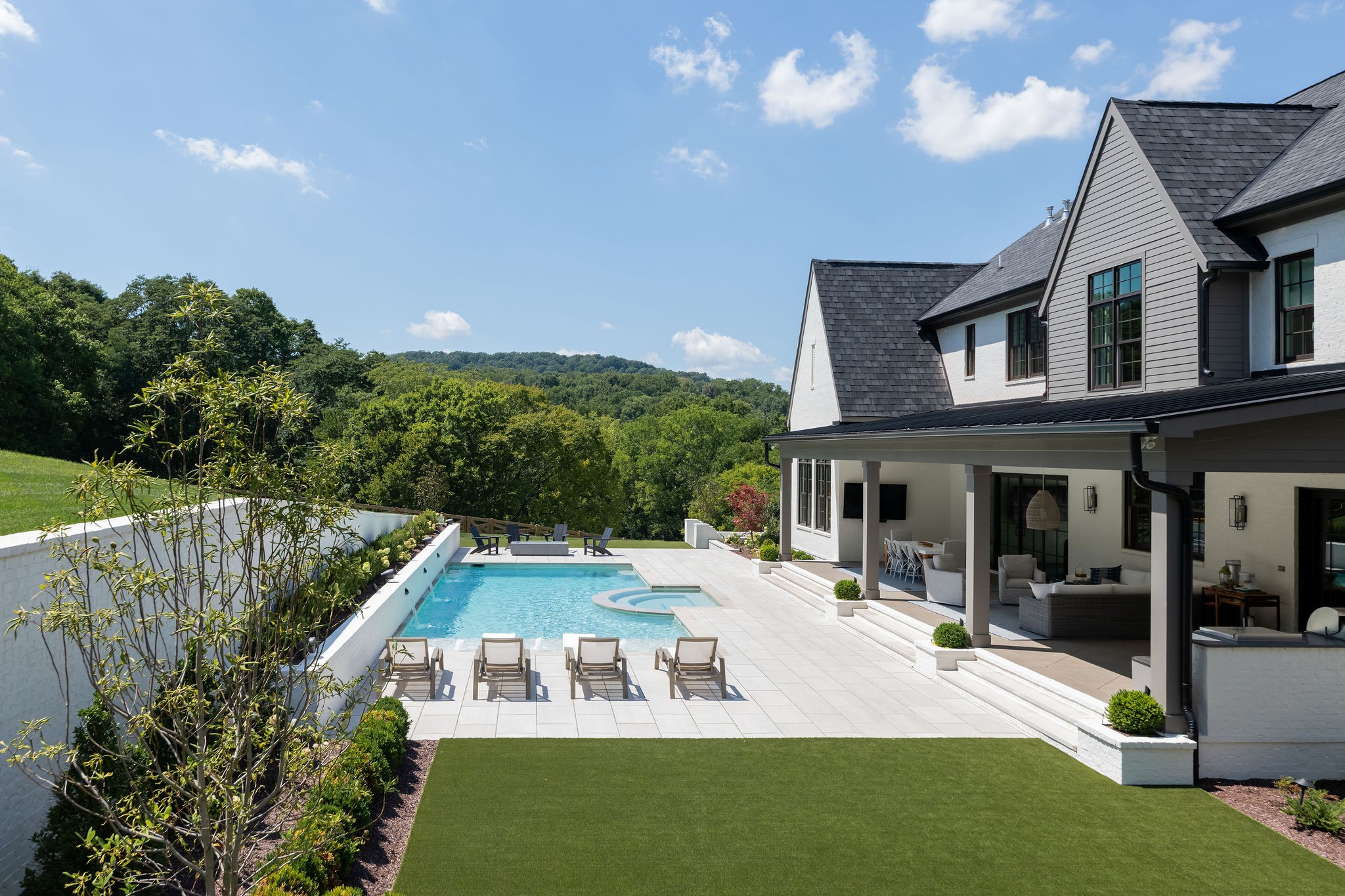 7001 Holts Reserve Road College Grove, TN 37046 - Photo 11 of 19 a view of swimming pool with seating area and trees in the background