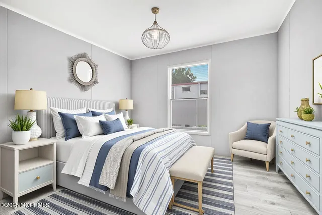 a bedroom with bed and window