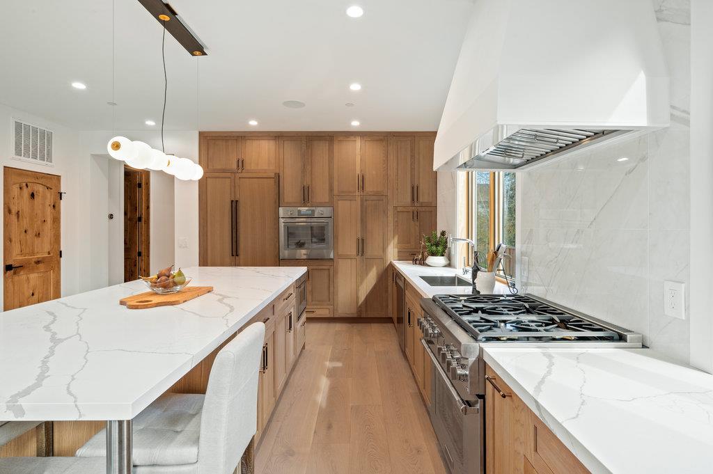 1327 Benito Avenue Burlingame, CA 94010 - Photo 11 of 41 a kitchen with a stove and a refrigerator