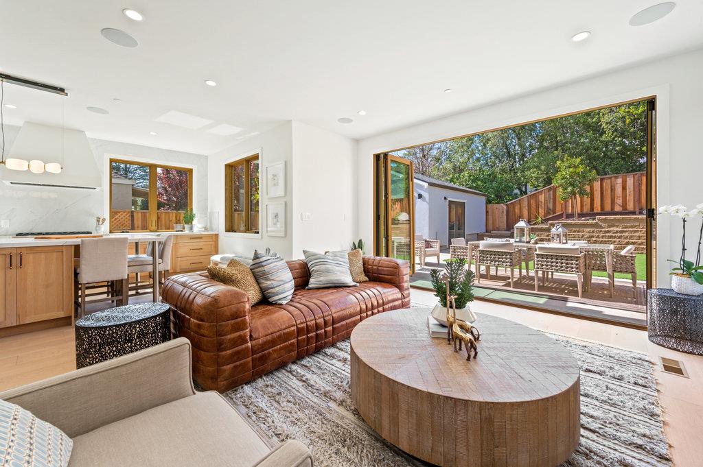1327 Benito Avenue Burlingame, CA 94010 - Photo 13 of 41 a living room with furniture and a large window
