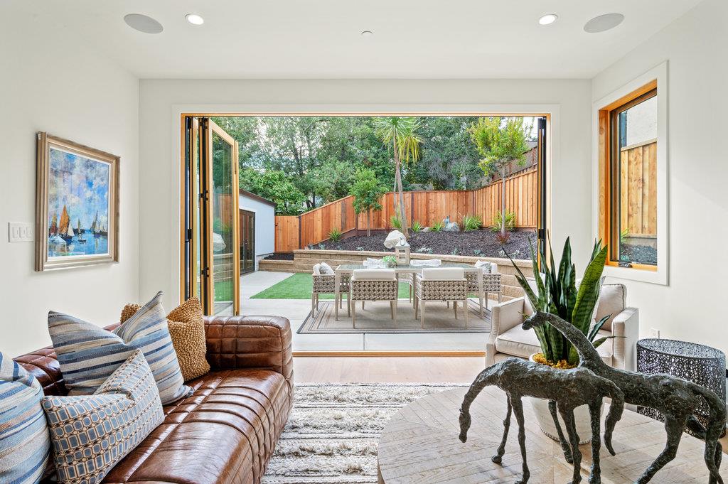 1327 Benito Avenue Burlingame, CA 94010 - Photo 17 of 41 a living room with furniture and a large window