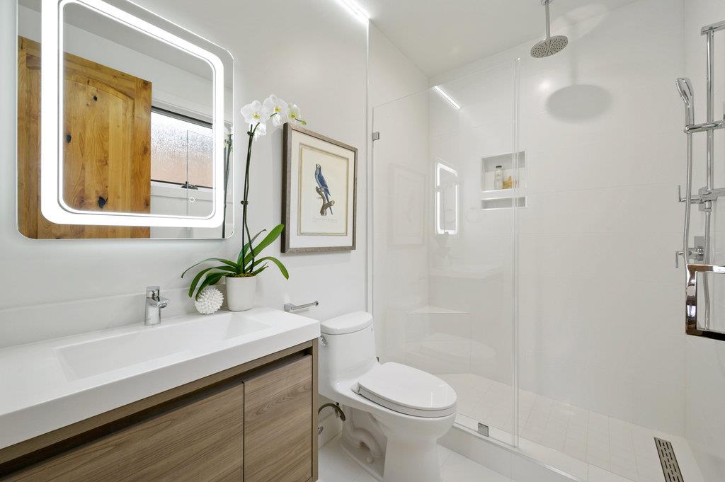 1327 Benito Avenue Burlingame, CA 94010 - Photo 23 of 41 a bathroom with a sink a toilet and shower