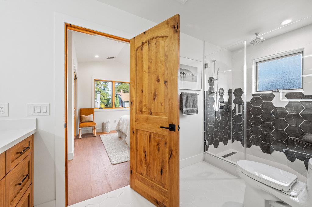 1327 Benito Avenue Burlingame, CA 94010 - Photo 32 of 41 a bathroom with a sink a toilet and shower