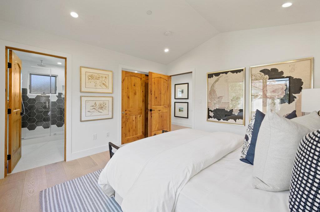 1327 Benito Avenue Burlingame, CA 94010 - Photo 35 of 41 a bedroom with a bed and a walk in closet