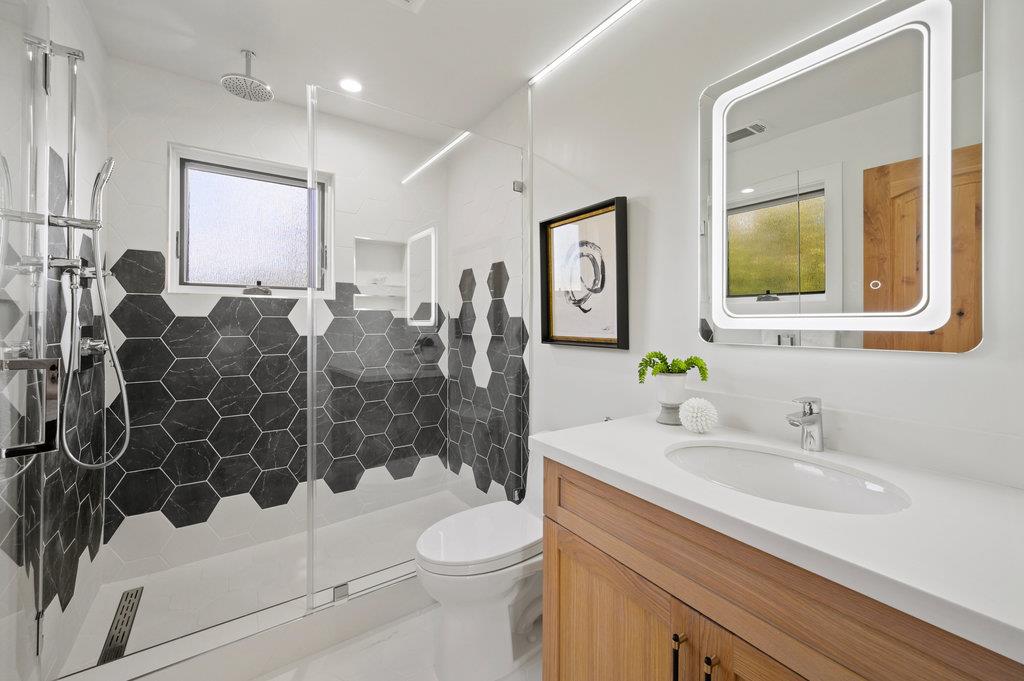 1327 Benito Avenue Burlingame, CA 94010 - Photo 37 of 41 a bathroom with a sink toilet and shower