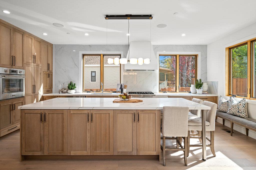 1327 Benito Avenue Burlingame, CA 94010 - Photo 9 of 41 a kitchen with stainless steel appliances granite countertop a sink and a refrigerator