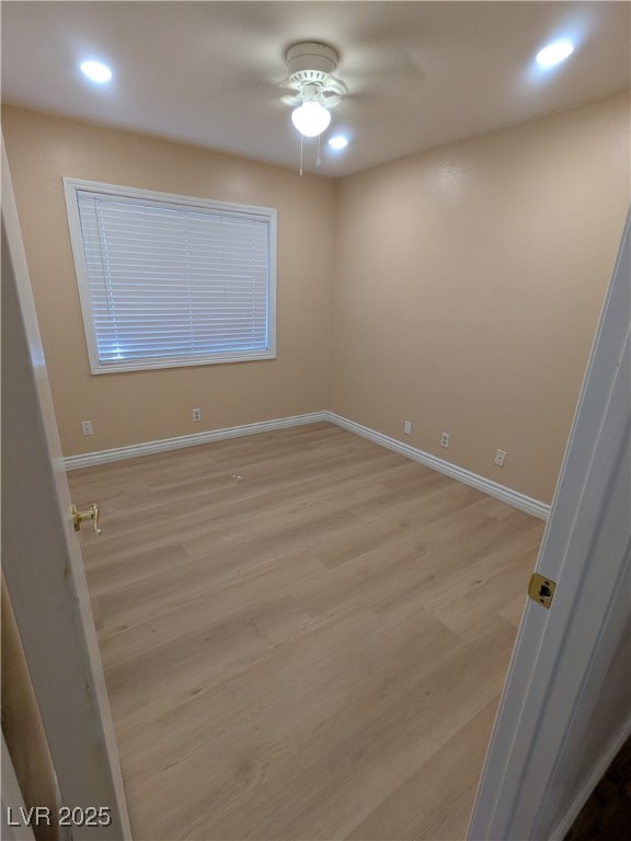 7301 Pleasant View Avenue Las Vegas, NV 89147 - Photo 17 of 37 Unfurnished bedroom with light wood-type flooring, ceiling fan, and recessed lighting