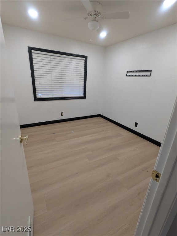 7301 Pleasant View Avenue Las Vegas, NV 89147 - Photo 19 of 37 Unfurnished room with light wood-style floors and recessed lighting
