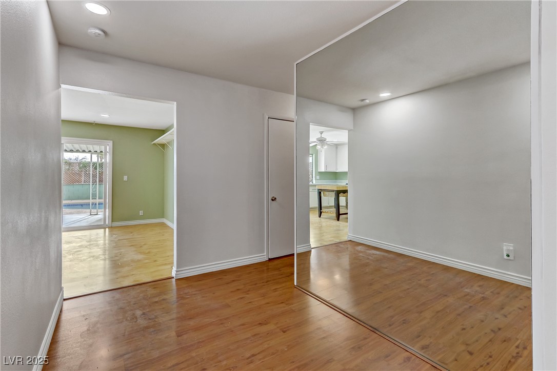 7301 Pleasant View Avenue Las Vegas, NV 89147 - Photo 6 of 37 Spare room featuring light wood-type flooring, recessed lighting, and ceiling fan