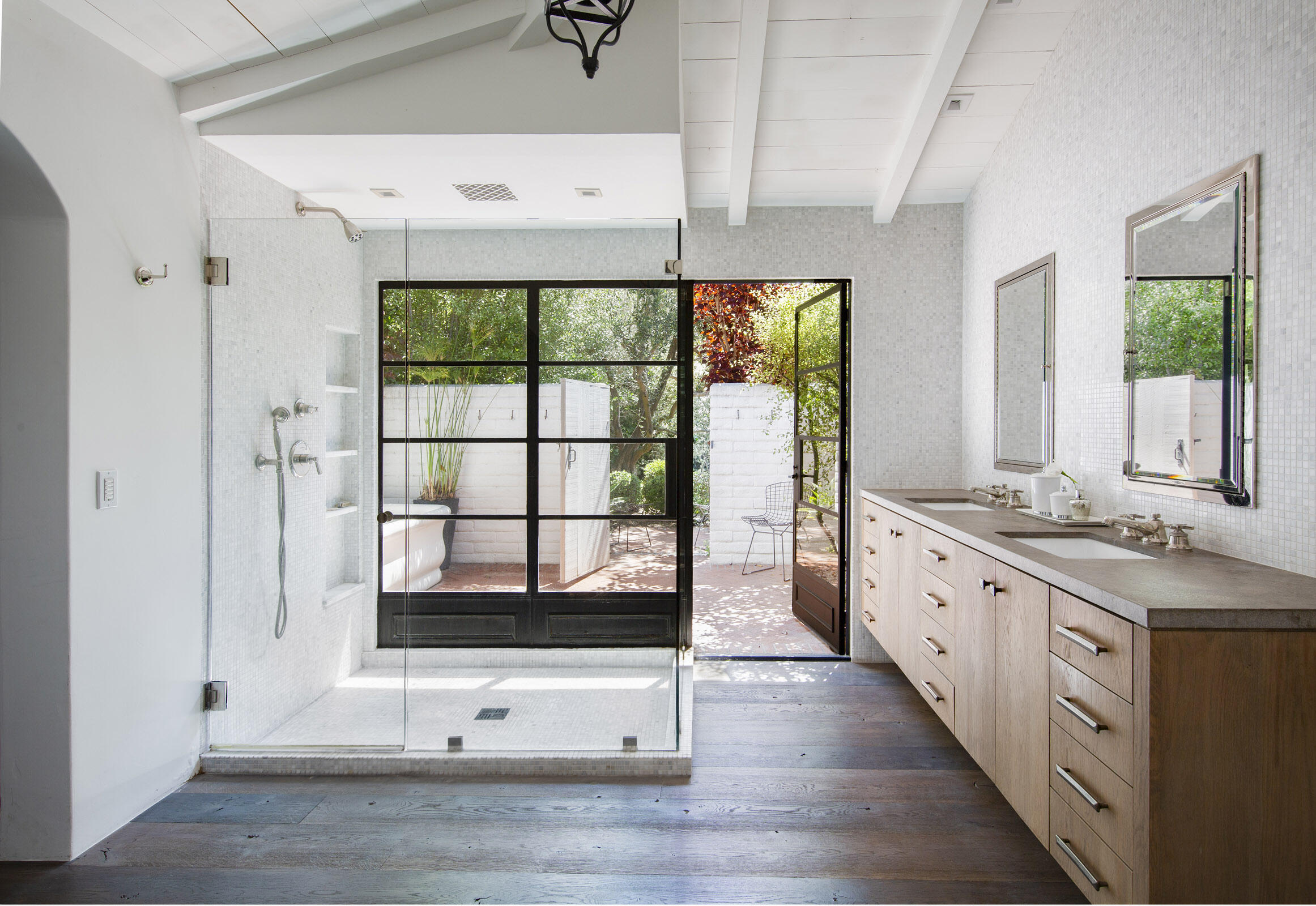 770 Via Manana Montecito, CA 93108 - Photo 16 of 34 a kitchen with granite countertop a stove a sink and a large window