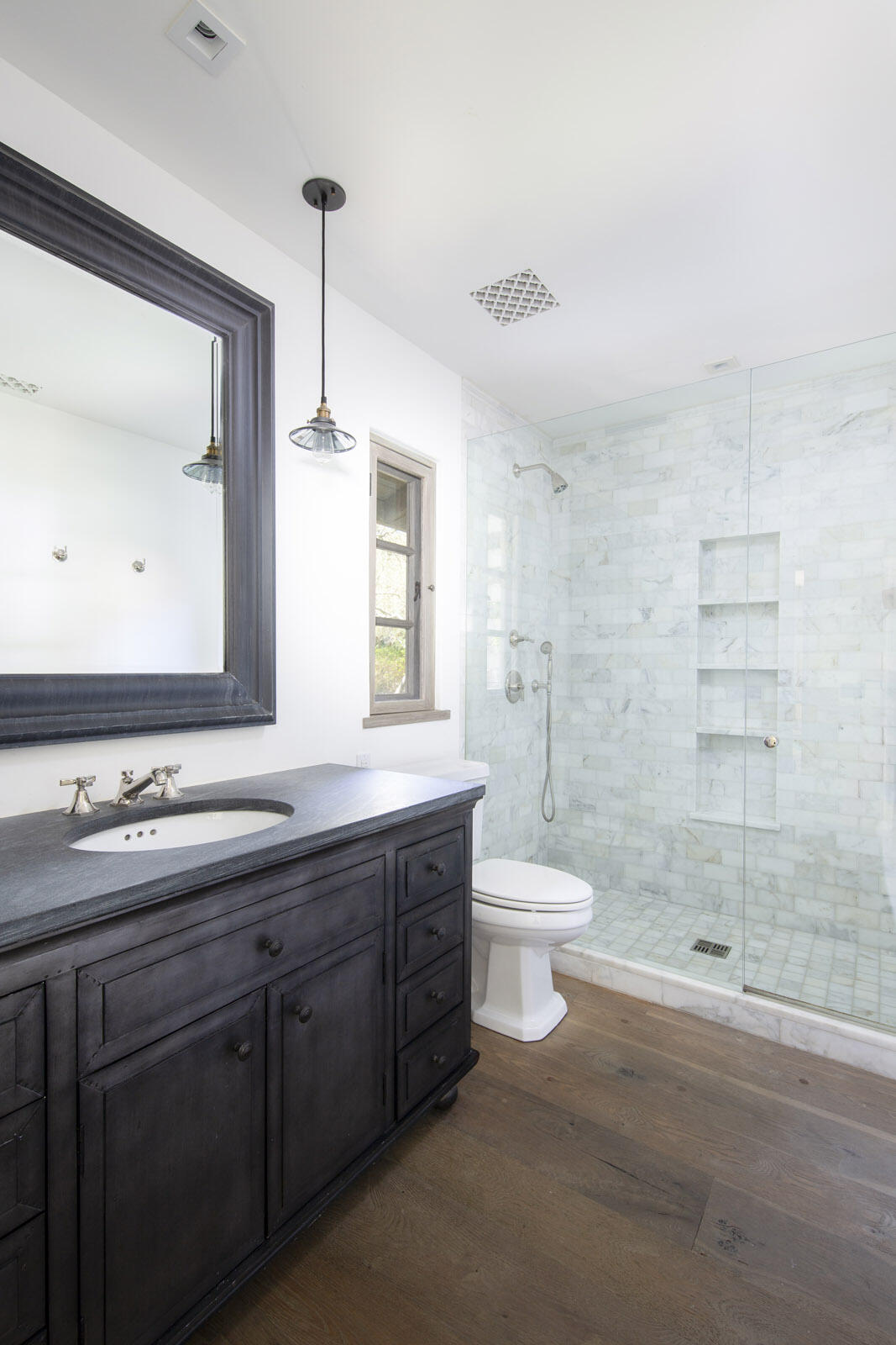 770 Via Manana Montecito, CA 93108 - Photo 21 of 34 a bathroom with a toilet a sink a mirror and a shower