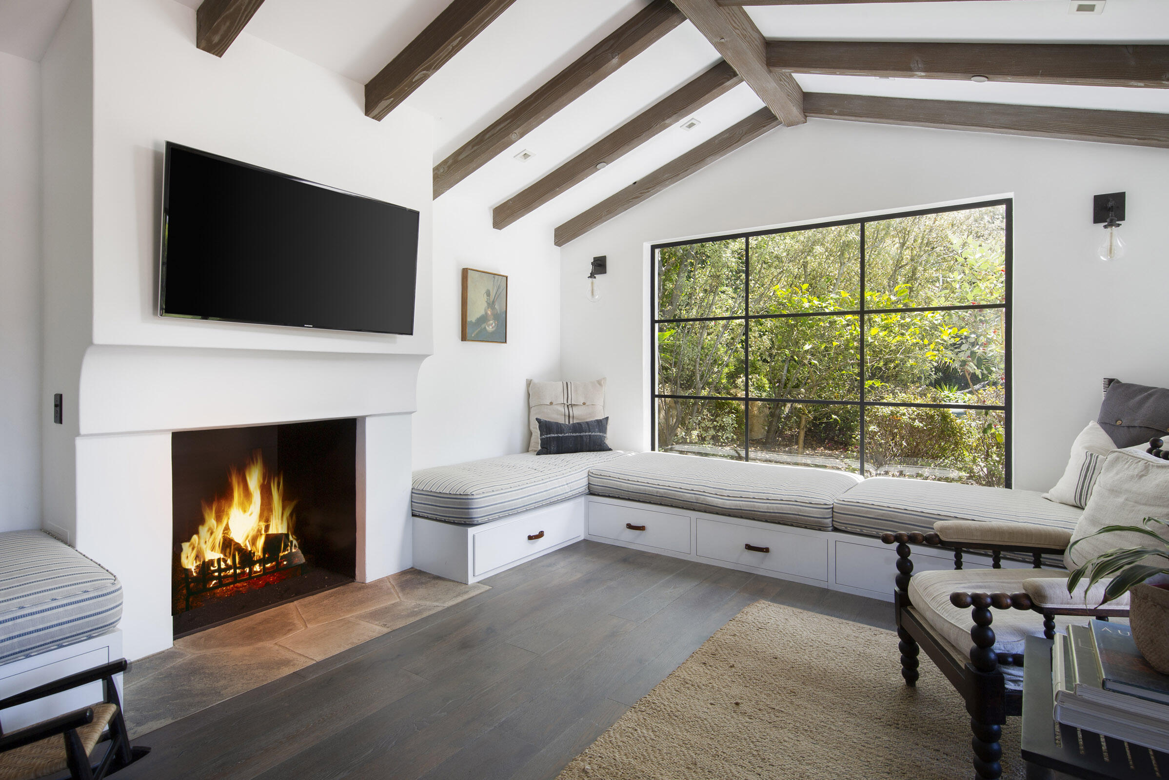 770 Via Manana Montecito, CA 93108 - Photo 25 of 34 a living room with furniture fireplace and flat screen tv