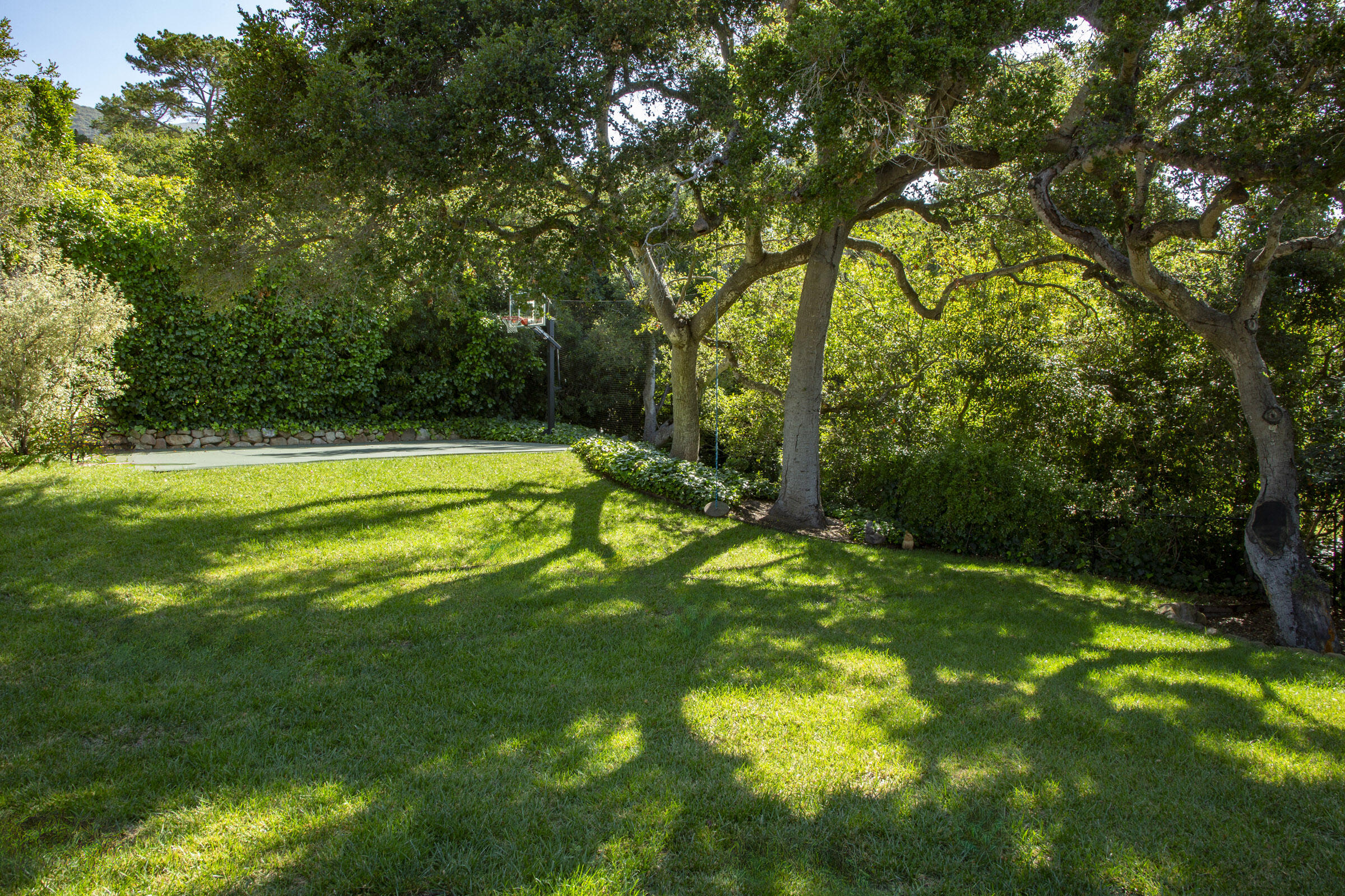 770 Via Manana Montecito, CA 93108 - Photo 28 of 34 a view of a backyard with a large trees