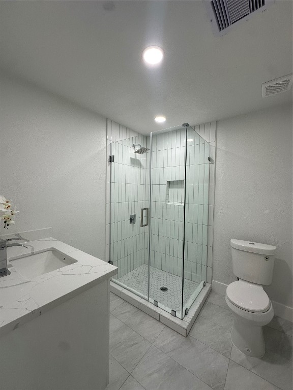 726 Banton Street Channelview, TX 77530 - Photo 16 of 30 a spacious bathroom with a shower a toilet and a sink