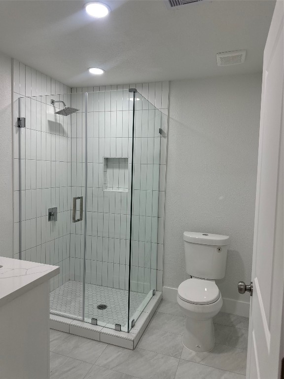 726 Banton Street Channelview, TX 77530 - Photo 18 of 30 a bathroom with a toilet and a shower